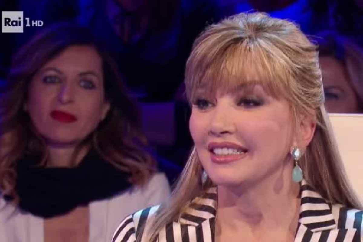 parole carlucci maria de filippi
