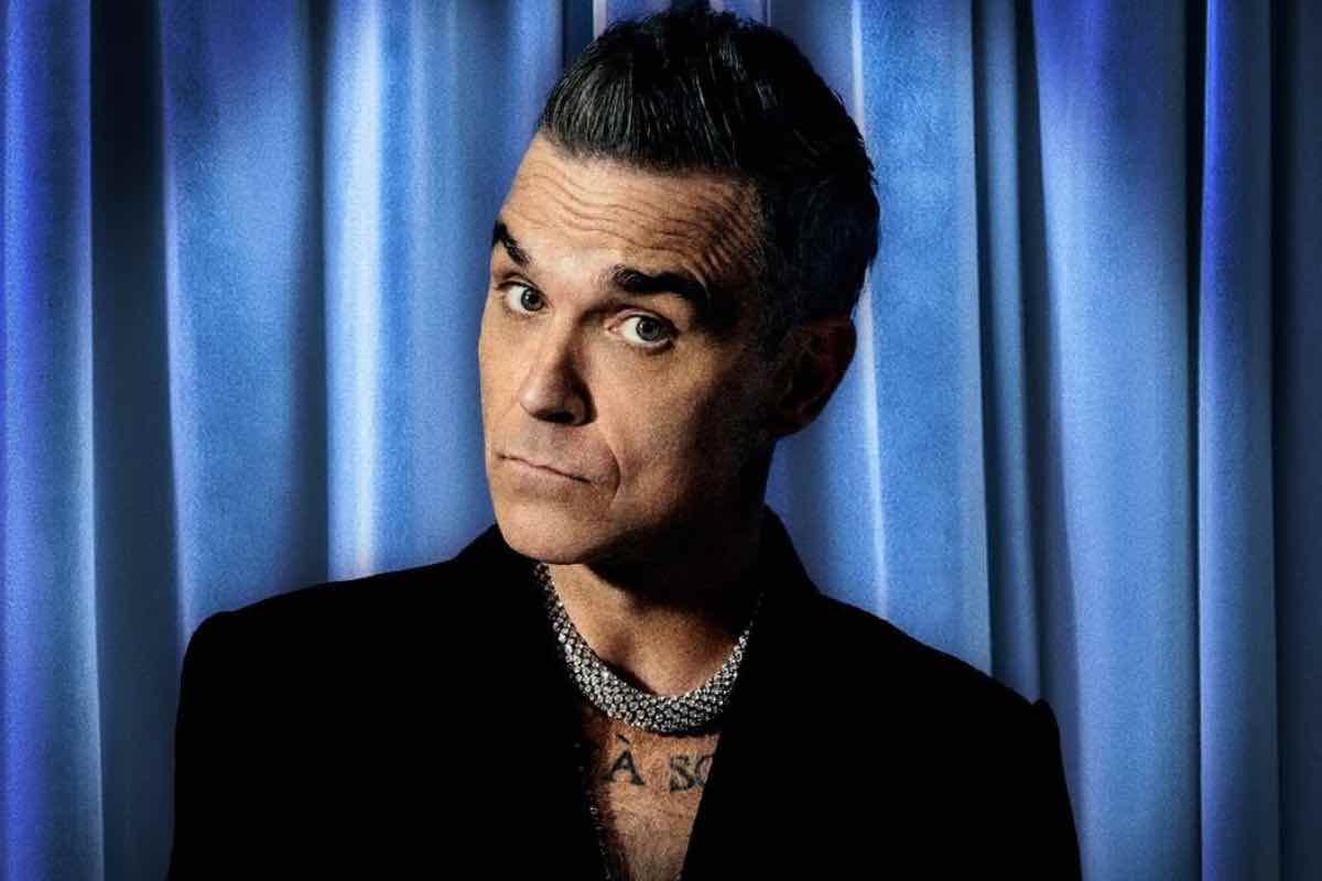 Dietro le quinte di Robbie Williams: il nome deciso dai Take That e il rifiuto shock ai Queen